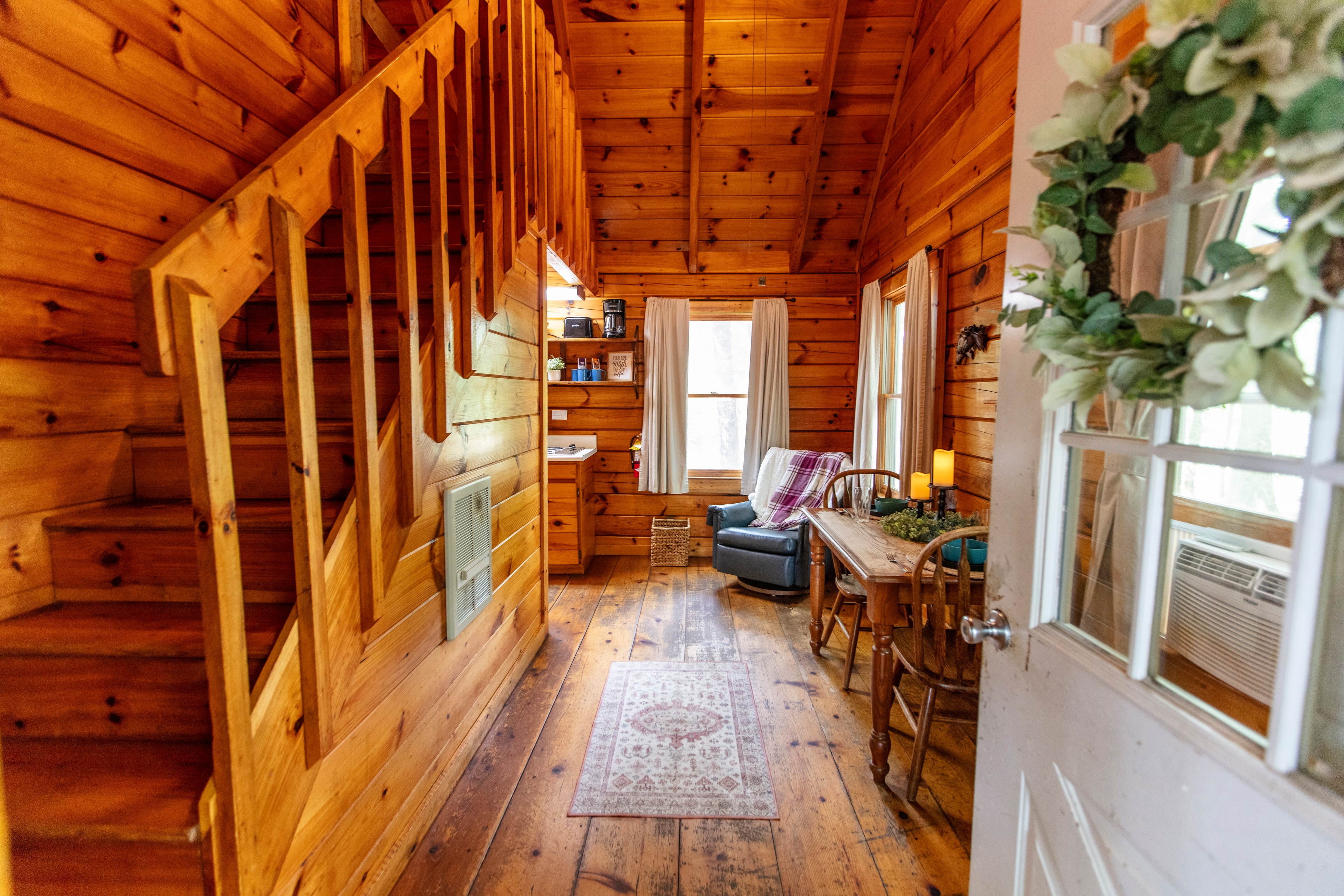 Cozy lodge interior with fireplace at R Ranch